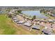 Aerial view of homes in Sun City Center near a pond, showcasing the community's layout and residential options at 1021 Augusta Dr, Sun City Center, FL 33573