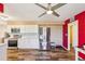 Updated kitchen features stainless steel appliances, stone countertops, and modern cabinetry for a sleek look at 1021 Augusta Dr, Sun City Center, FL 33573