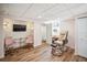 Finished basement area with wood-look floors and special salon space at 1235 14Th N St, St Petersburg, FL 33705
