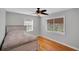 Bedroom with hardwood floors, ceiling fan, and natural light from the window at 1235 14Th N St, St Petersburg, FL 33705