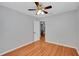 Bedroom with hardwood floors, ceiling fan, natural light and open doorway at 1235 14Th N St, St Petersburg, FL 33705