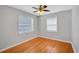 Bedroom with hardwood floors and bright natural light from two large windows at 1235 14Th N St, St Petersburg, FL 33705