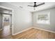 Cozy bedroom showcasing hardwood floors and ample natural light at 1235 14Th N St, St Petersburg, FL 33705