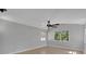 A spacious bedroom featuring hardwood floors and a ceiling fan with ample natural light at 1235 14Th N St, St Petersburg, FL 33705