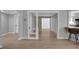 Spacious living area with hardwood floors and easy access to kitchen and hallways at 1235 14Th N St, St Petersburg, FL 33705