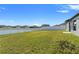 Over-sized backyard offers a great view and is enhanced by a pristine white picket fence at 13538 Willow Bluestar Loop, Riverview, FL 33579