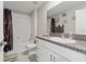Clean bathroom features a white vanity with granite countertop, a tub-shower combo, and modern fixtures at 13538 Willow Bluestar Loop, Riverview, FL 33579