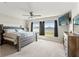 Spacious main bedroom with large windows providing natural light and a neutral color palette at 13538 Willow Bluestar Loop, Riverview, FL 33579