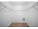 An empty closet with wooden floors and white wire shelving at 14916 Rocky Ledge Dr, Tampa, FL 33625