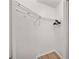 Walk-in closet with wire shelving and wood floor at 14916 Rocky Ledge Dr, Tampa, FL 33625