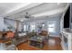 Living room featuring hardwood floors, natural light, modern furnishings, an open layout, and a cozy atmosphere at 2005 Jackson N St, St Petersburg, FL 33704