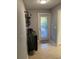 Mudroom featuring a sink, cabinets, shelves, and an exterior door leading to the deck at 2005 Jackson N St, St Petersburg, FL 33704