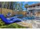 Inviting backyard pool with lounge chairs and manicured landscaping for relaxed, stylish outdoor living at 2005 Jackson N St, St Petersburg, FL 33704