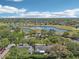 Aerial view of a residential area with water features and community amenities at 2009 Halidom Way, Sun City Center, FL 33573
