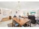 Open floor plan featuring a dining area with stylish furnishings and ample natural light at 2009 Halidom Way, Sun City Center, FL 33573