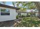 The house is surrounded by lush greenery at 2009 Halidom Way, Sun City Center, FL 33573