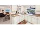 Functional kitchen with a double sink, ample counter space, and a pass-through to the dining room at 2009 Halidom Way, Sun City Center, FL 33573