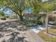 Charming neighborhood street view with well-kept homes and lush landscaping at 2009 Halidom Way, Sun City Center, FL 33573