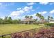 Community dog park with a gazebo in the background and an area for the dogs to run at 2011 Hawks View Dr, Ruskin, FL 33570