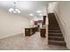 Modern kitchen with stainless steel appliances, granite countertops, and a breakfast bar island at 2011 Hawks View Dr, Ruskin, FL 33570