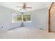 Bedroom with corner windows providing generous natural light, creating a bright and inviting atmosphere at 311 Ravenna N St, Nokomis, FL 34275