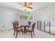 Dining room with bright natural light, offering a cozy space for intimate meals and entertaining at 311 Ravenna N St, Nokomis, FL 34275