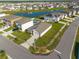Aerial view of a corner lot home, with lush green lawn and well-maintained landscaping in a Gathering-friendly neighborhood at 31399 Penny Surf Loop, Wesley Chapel, FL 33545