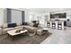 View of an open-concept living room and kitchen with modern décor and stainless appliances at 31399 Penny Surf Loop, Wesley Chapel, FL 33545