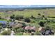 Scenic aerial view showcases houses with spacious yards backing onto lush greenery and serene landscape at 31730 Spoonflower Cir, Wesley Chapel, FL 33545
