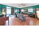 Spacious living room with hardwood floors and fireplace at 31730 Spoonflower Cir, Wesley Chapel, FL 33545