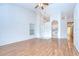 Spacious living room with vaulted ceilings, hardwood floors and bright natural light at 34907 Double Eagle Ct, Zephyrhills, FL 33541