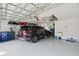 Well-organized garage with epoxy flooring, storage racks, and ample space for parking and storage at 3709 W Horatio St, Tampa, FL 33609