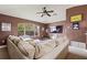 Spacious living room featuring a large window and a ceiling fan at 3709 W Horatio St, Tampa, FL 33609