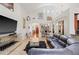 Spacious living room featuring high ceilings, elegant decor, and an open floor plan at 3709 W Horatio St, Tampa, FL 33609