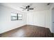 Bedroom with hard wood floors, large closet and bright window at 3710 W Griflow St, Tampa, FL 33629