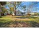 Charming single-story home with mature trees in the front yard at 3710 W Griflow St, Tampa, FL 33629