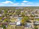 Wide aerial view of the home in a peaceful suburban neighborhood at 3860 Whiting Se Dr, St Petersburg, FL 33705