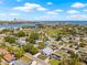 Bird's eye view of the home in a lovely neighborhood with city skyline at 3860 Whiting Se Dr, St Petersburg, FL 33705