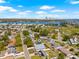 Lovely aerial shot of a home near the water with the city skyline in view at 3860 Whiting Se Dr, St Petersburg, FL 33705