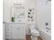 Bathroom featuring a white vanity, framed mirror and a shower-tub combination at 3860 Whiting Se Dr, St Petersburg, FL 33705