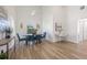 Bright dining area with modern decor, a stylish table and chairs, with lots of natural light at 3860 Whiting Se Dr, St Petersburg, FL 33705