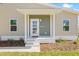 Close up of a charming home's front porch and door at 3860 Whiting Se Dr, St Petersburg, FL 33705