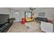 Stylish living room featuring modern decor, a comfortable seating arrangement, and a large entertainment center at 401 Dorchester Pl # 69, Sun City Center, FL 33573