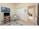 Charming bedroom features coastal decor, soft natural light and closet with doors at 412 Pinewood Dr, Oldsmar, FL 34677