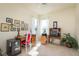 Inviting office area has bright windows, a ceiling fan, and space for two desks at 412 Pinewood Dr, Oldsmar, FL 34677