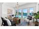 Cozy living space with waterfront views, comfortable seating, and stylish decor at 517 Belle Isle Ave, Belleair Beach, FL 33786