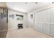 Bright bedroom with ample closet space, neutral walls, and natural light, perfect for relaxation at 520 Belle Isle Ave, Belleair Beach, FL 33786