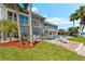 This bayside home offers great views and an outdoor pool for those hot summer days at 520 Belle Isle Ave, Belleair Beach, FL 33786