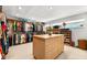 Spacious walk-in closet with custom shelving and plenty of storage space at 520 Belle Isle Ave, Belleair Beach, FL 33786