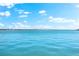 Panoramic view of the tranquil blue water and the bridge stretching across the horizon at 520 Belle Isle Ave, Belleair Beach, FL 33786